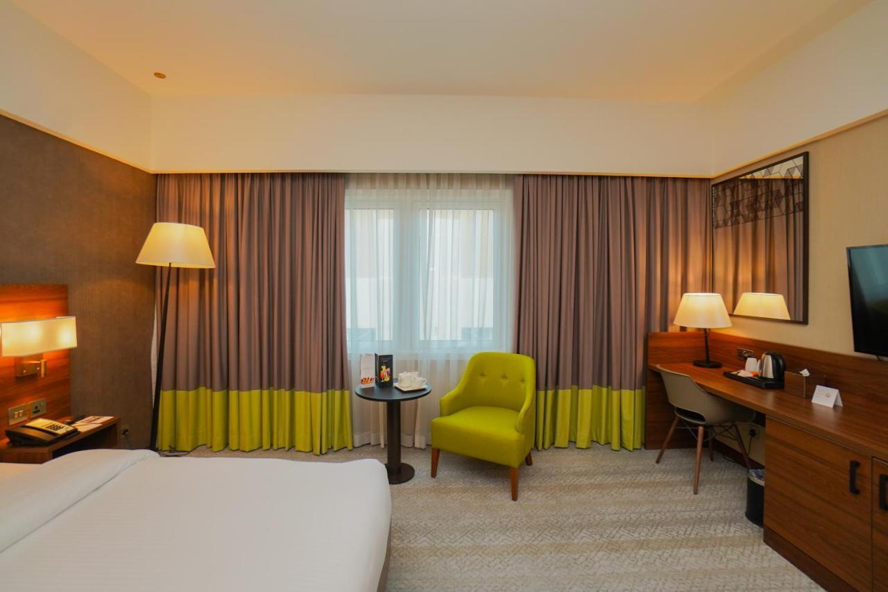 The Grand Lux Hotel Doha Eksteriør bilde A room at the hotel