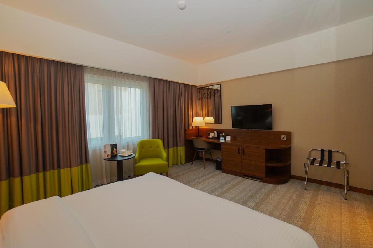 The Grand Lux Hotel Doha Eksteriør bilde A room at the hotel