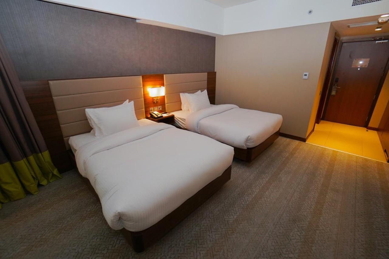 The Grand Lux Hotel Doha Eksteriør bilde Deluxe room