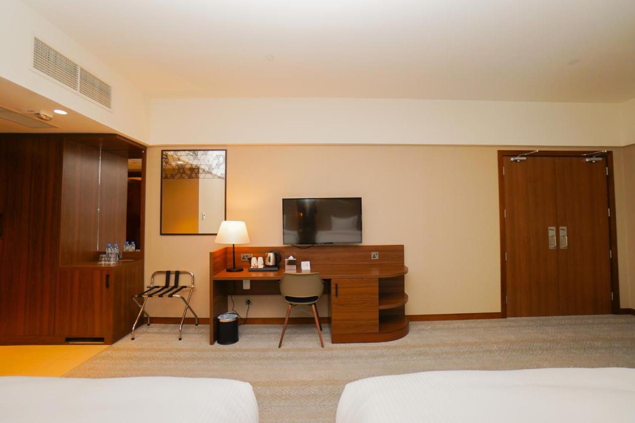 The Grand Lux Hotel Doha Eksteriør bilde A room at the hotel