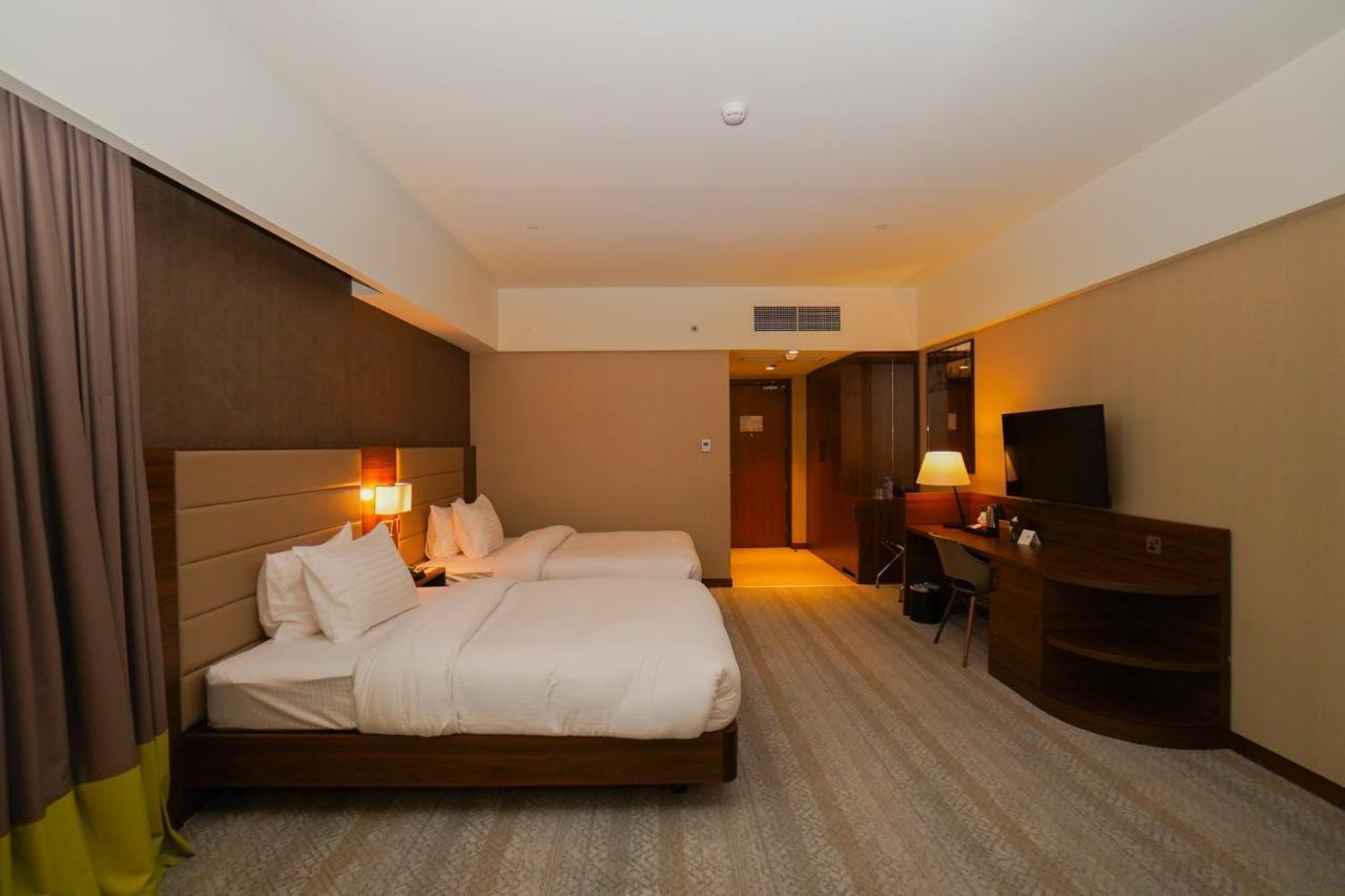 The Grand Lux Hotel Doha Eksteriør bilde Deluxe room