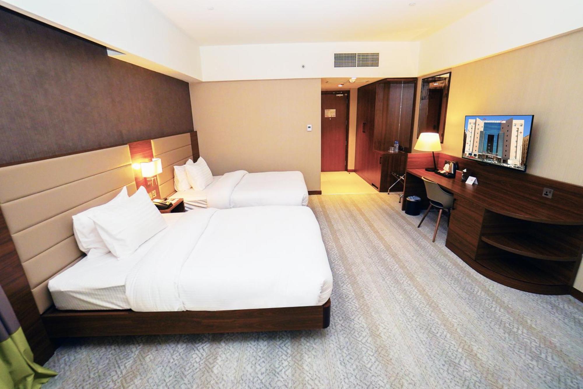 The Grand Lux Hotel Doha Eksteriør bilde Deluxe Room